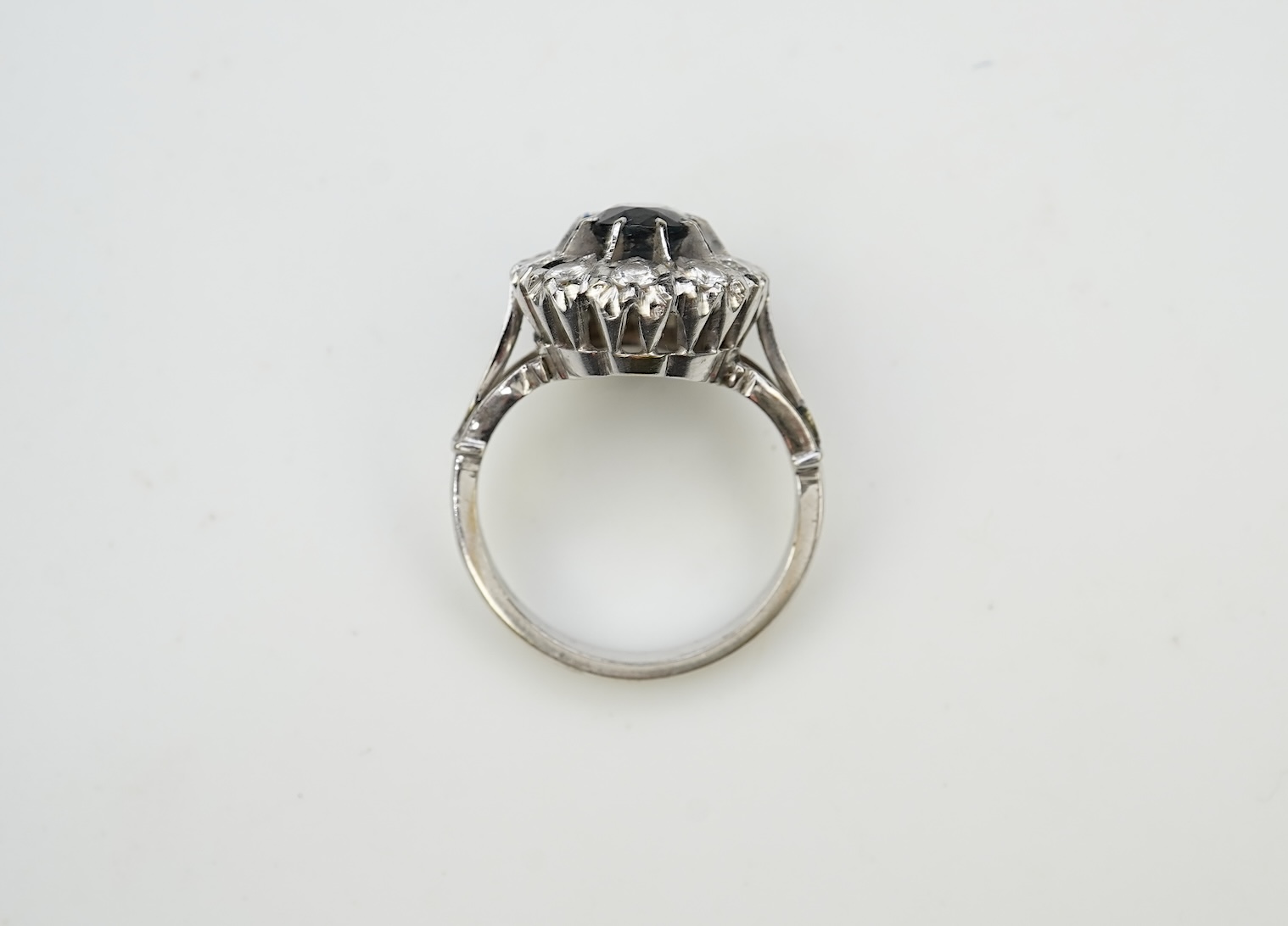 A sapphire and diamond cluster ring